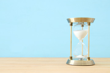 Hourglass as time passing concept for business deadline.