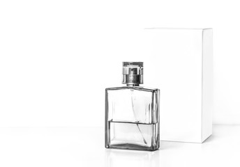 Perfume bottle and white packaging box mockup