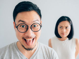 Tricky face husband and suspicious face wife.