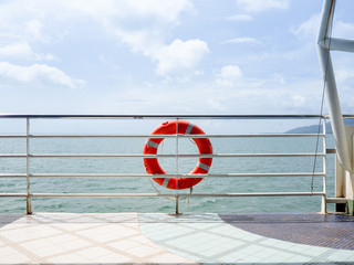 Red life ring on the ferry.