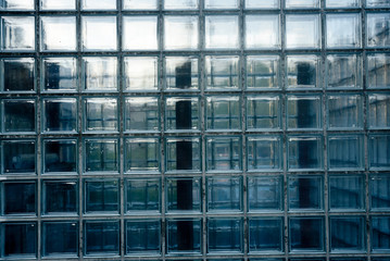 Plakat glass brick wall in business disctrict - photographed full frontal