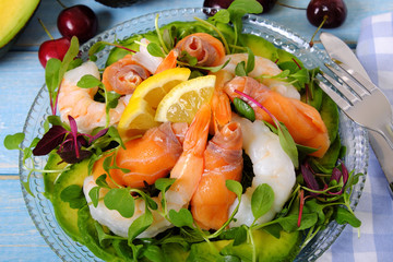 Prawn and smoked salmon summer salad close up