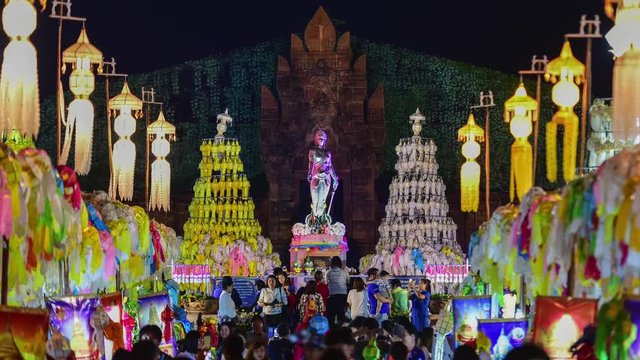 4k, timelapse, The Phra Nang Chamthewi Statue, Lamphun, Thailand &ndash; 10 May, 2017: Colorful thousands lanna lanterns at night, Lamphun lantern festival. (Zoom-Out)