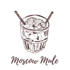 moscow mule cocktail in old fashioned glass garnished with lime and mint leaves