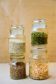 Beans, peas, wheat and pearl barley in jars