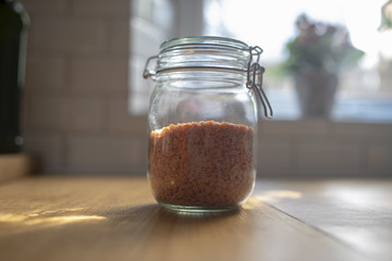 Red lentils in glass bowl