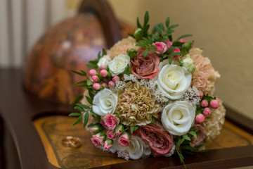 wedding bouquet and wedding rings