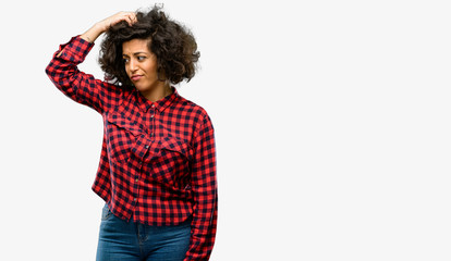 Beautiful arab woman doubt expression, confuse and wonder concept, uncertain future