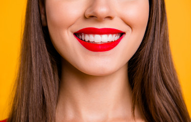 Crop close up portrait half face of woman with beaming smile while being at the dentist