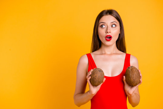 Oops I did it again! Travel resort tourism open mouth person people concept. Closeup photo portrait of shy shocked surprised amazed pretty lady holding fruit near chest isolated bright background