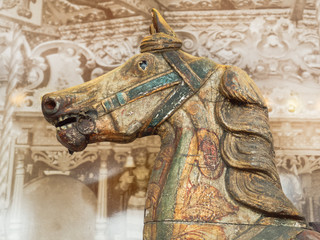 head shot of vintage wooden horse from carousel funfair ride - 213782211