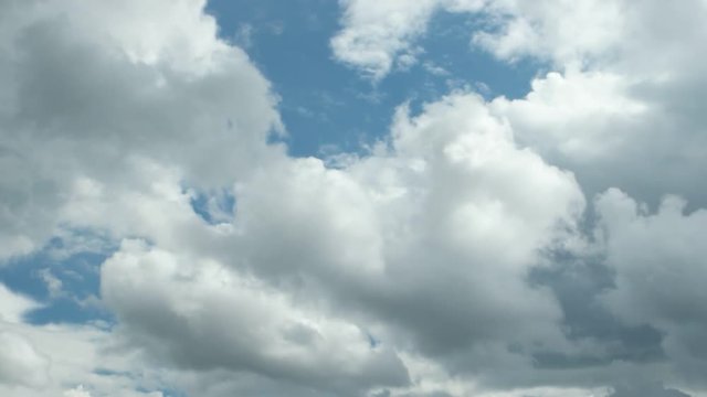 white clouds running on blue sky, Western Ukraine, time lapse