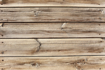 Obraz premium Wooden background. Texture of a wooden fence. Unpainted board.