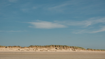 England, Cornwall, Daymer Bay, Sand dunes and blue with whisky cloudsky