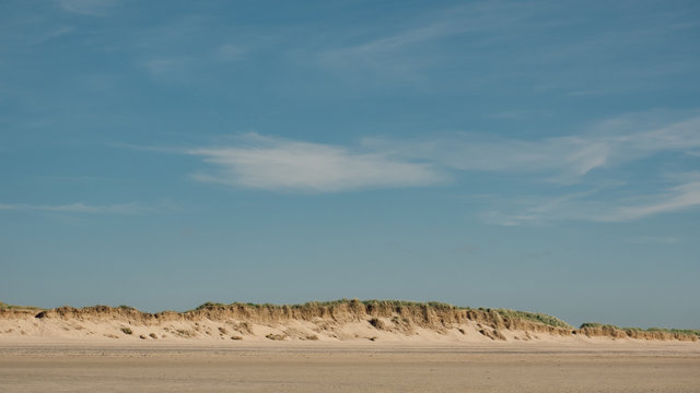 England, Cornwall, Daymer Bay, Sand dunes and blue with whisky cloudsky