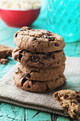 Cookies for breakfast on old cyan wooden table