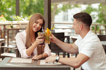Two people in cafe enjoying the time spending with each other