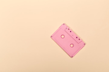 Retro cassette tapes on color background