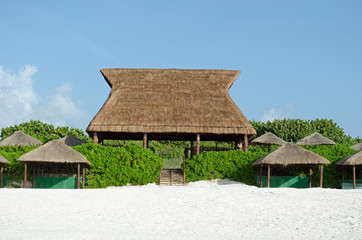 Hay roof hut at beach. Maxico