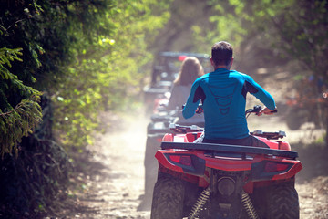 man riding atv vehicle on off road track ,people outdoor sport activitiies theme © FS-Stock