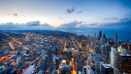 Fototapeta premium A look at the Chicago skyline near sunset from the Willis Tower Skydeck in Chicago, Illinois