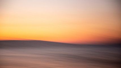 Fototapeta na wymiar Wave at Sunset