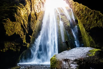 Fotobehang Perfect view of famous powerful Gljufrabui waterfall in sunlight. © Leonid Tit
