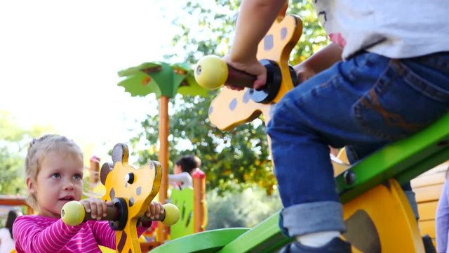Active kids have fun playing on outdoors playground for children in Sofia Bulgaria