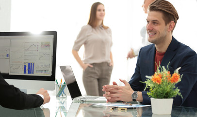 senior and junior businessman discuss something during their meeting