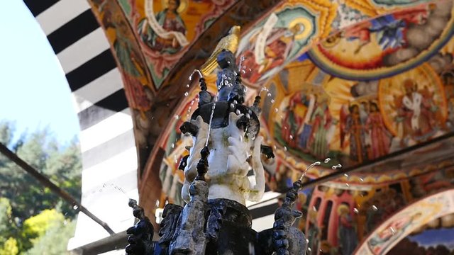 Beautiful water fountain in courtyard of male friary Rila Monastery of Bulgarian church
