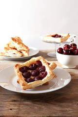 Freshly baked puff pastry with cherries