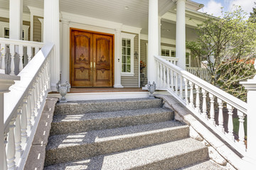 Entrance to a luxury country home with wrap-around deck.