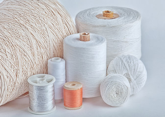 different types of white threads cotton, elastic band, flax, plait, mouline thread, silk