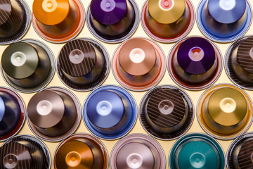 symetrically arranged colorful coffe capsules