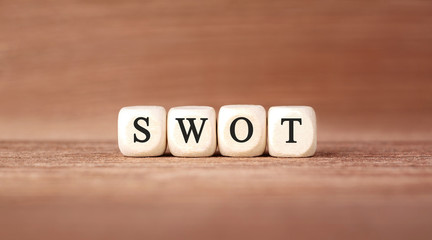 Word SWOT made with wood building blocks