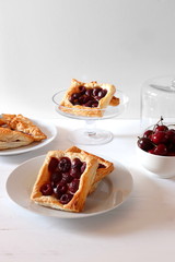 Freshly baked puff pastry with cherries