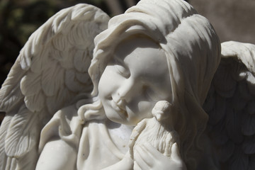 Angel statue with dove