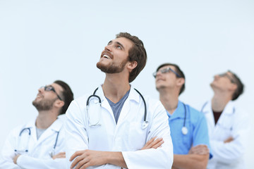 chief physician and colleagues looking at copy space