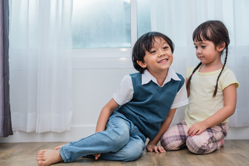 Two Caucasians brother and sister portrait. Children and kids concept. People and lifestyles...