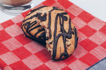 Cookies with jam with blue strip on white background