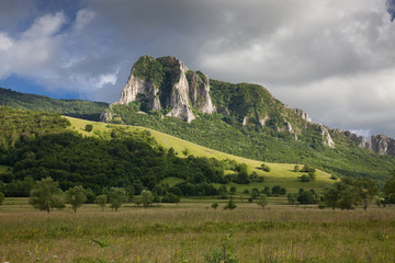 trascau mountains with piatra secuiului over the village of Rimetea - famous destination in Transylvania, Romania