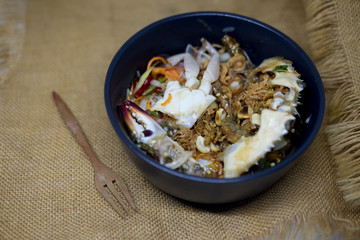 Spicy seafood salad with raw blue crab