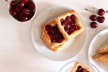 Freshly baked puff pastry with cherries