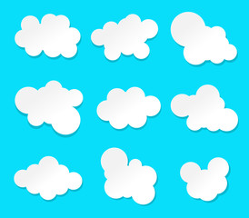Set of cartoon clouds isolated on a blue background. paper art vector illustration.
