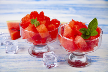 Pieces of watermelon, ice and mint
