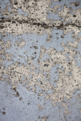 Damaged & Painted Concrete