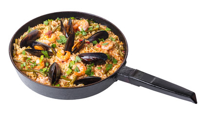 frying pan with paella seafood
