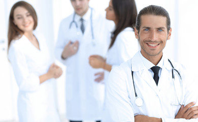 Fototapeta premium smiling doctor therapist on blurred background.