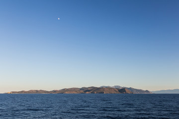 A view from the sea of the island of Corsica in the mediterranean sea in France