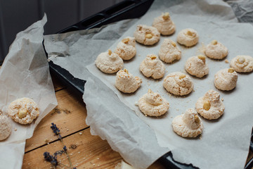 Baking tray with delicious coconut macaroons. Closeup